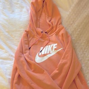 Peach Nike hoodie size S.